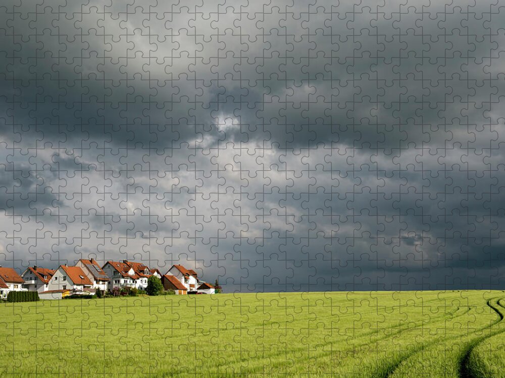 Scenics Jigsaw Puzzle featuring the photograph Homes And Grain Field With Winding Tire by Thomas Winz
