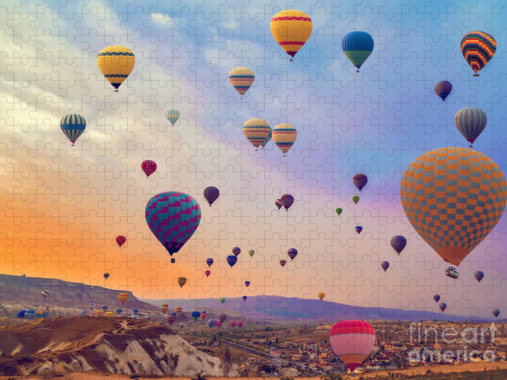 Heat Puzzle featuring the photograph Hot Air Balloons Flying Over Mountains by Vladyslav Danilin