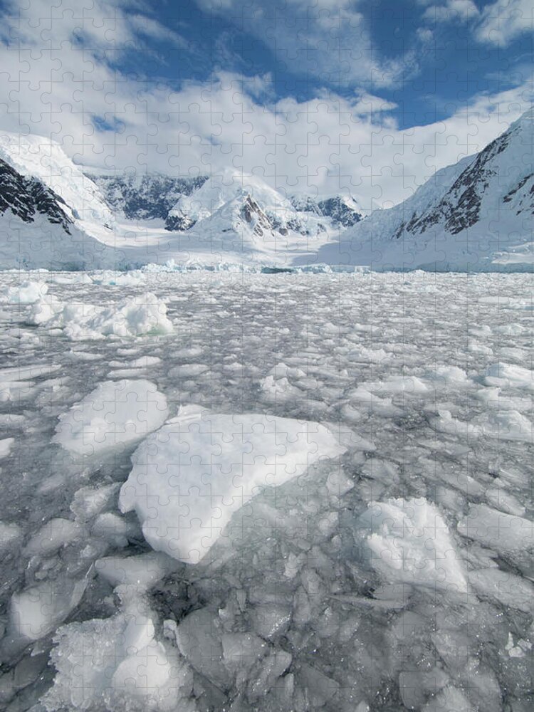 Melting Jigsaw Puzzle featuring the photograph Ice At The Base Of A Glacier In by Mint Images - David Schultz