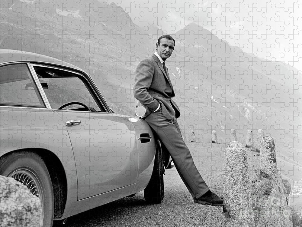 James Bond Jigsaw Puzzle featuring the photograph James Bond Coolly Leaning on His Aston Martin by Doc Braham
