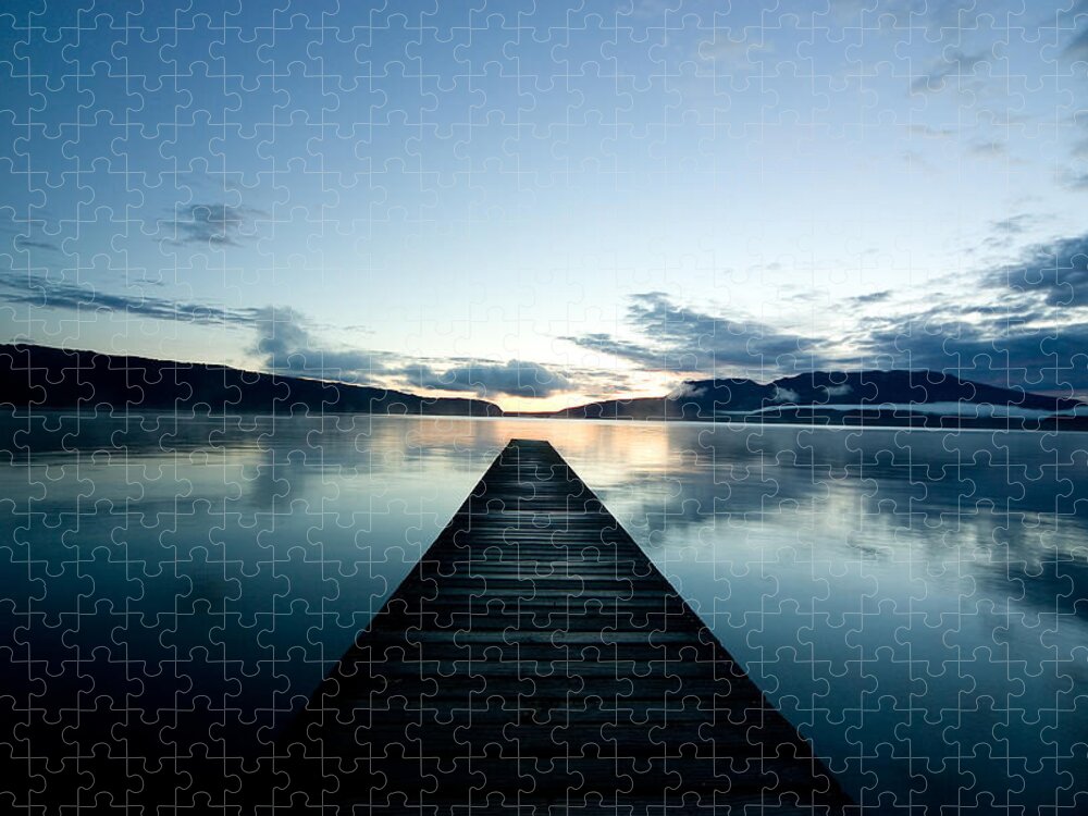 Tranquility Jigsaw Puzzle featuring the photograph Jetty On Lake Tarawera At Sunrise by Wowstockfootage