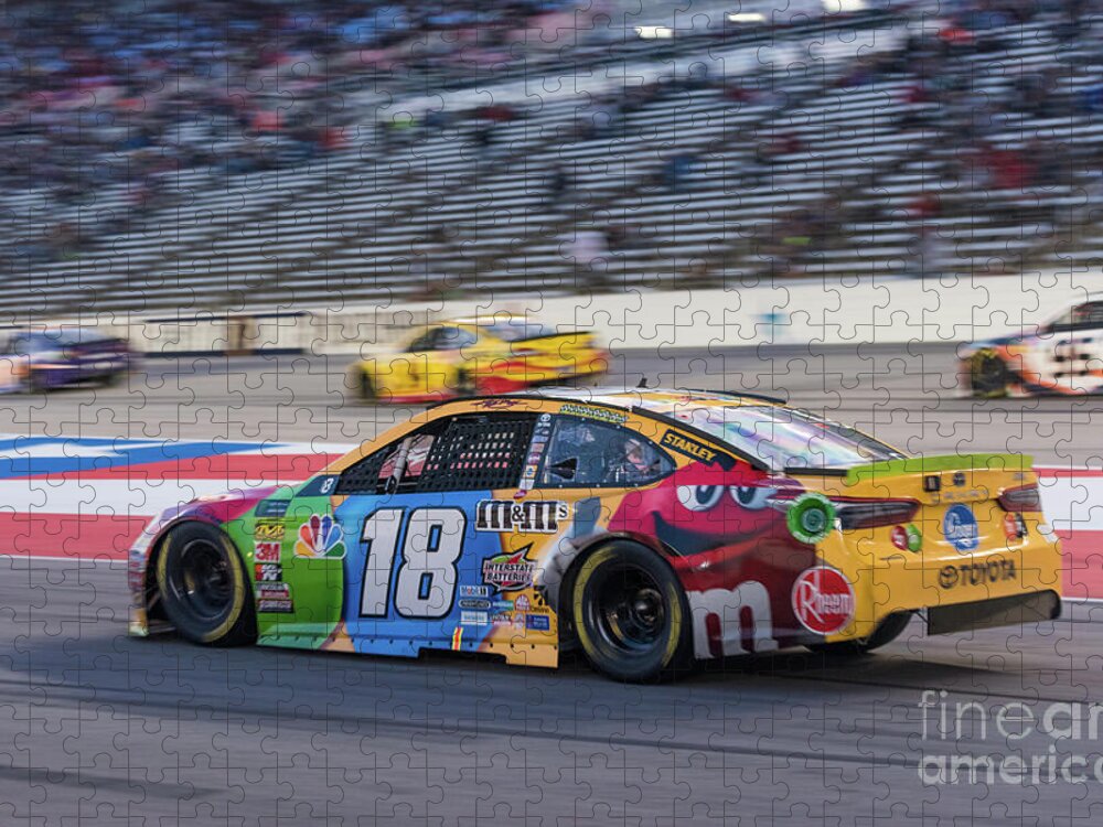 Kyle Busch Jigsaw Puzzle featuring the photograph Kyle Busch coming into the pits by Paul Quinn