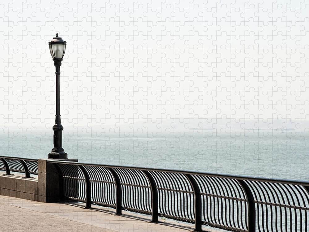 Tranquility Jigsaw Puzzle featuring the photograph Lamp At The Boardwalk by Andreas Schott