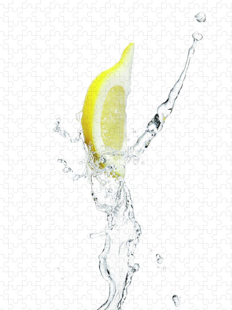 Purity Jigsaw Puzzle featuring the photograph Lemon Slice With A Splash Of Water by Chris Stein