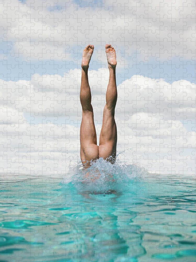 Diving Into Water Puzzle featuring the photograph Nude Man Diving by Ed Freeman