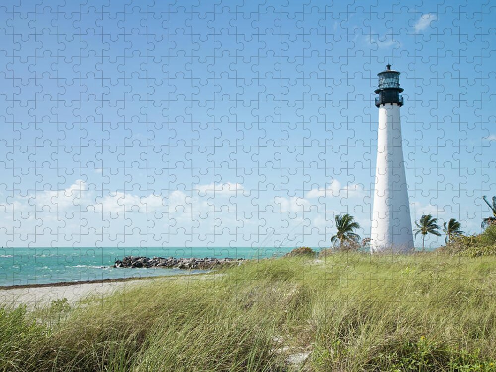 Grass Family Jigsaw Puzzle featuring the photograph Ocean And Coast With Lighthouse by Inti St. Clair