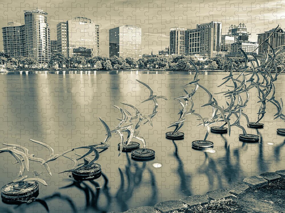 America Jigsaw Puzzle featuring the photograph Orlando Skyline and Take Flight Sculptures in Sepia by Gregory Ballos