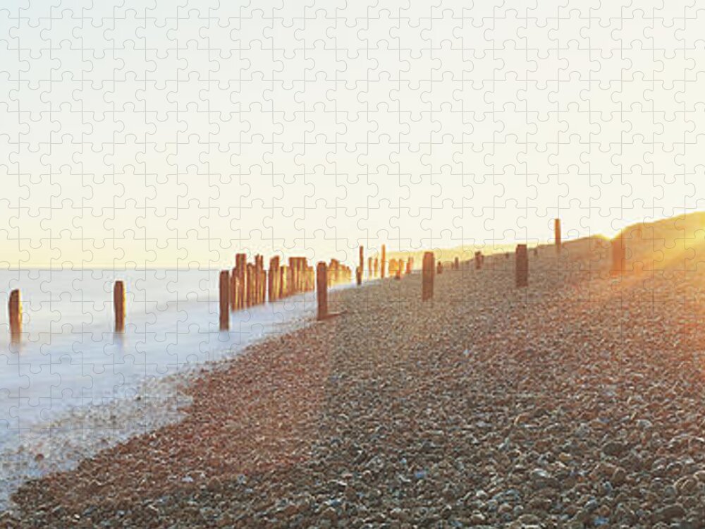 Water's Edge Jigsaw Puzzle featuring the photograph Pebble Beach At Sunset, Winchelsea by Stephen Barnett