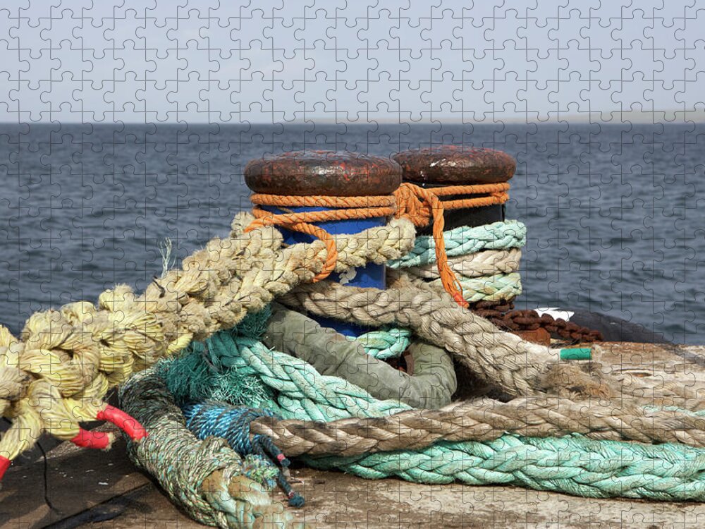 Scotland Jigsaw Puzzle featuring the photograph Ropes Tied Around Metal Bollards In A by Joe Fox