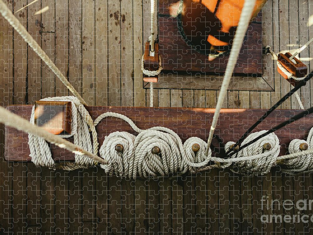 Abstract Jigsaw Puzzle featuring the photograph Ropes to hold the sails of an old sailboat rolled. by Joaquin Corbalan