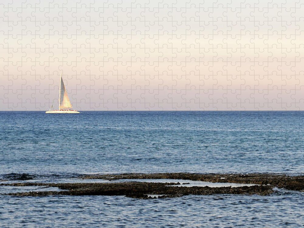 Sea Jigsaw Puzzle featuring the photograph Sailing boat in the Calm Ocean by Michalakis Ppalis