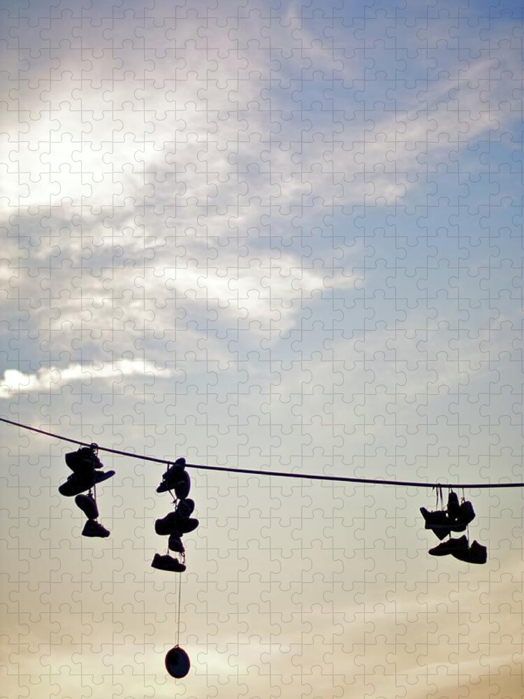 Hanging Jigsaw Puzzle featuring the photograph Shoes On A Line by Bailey