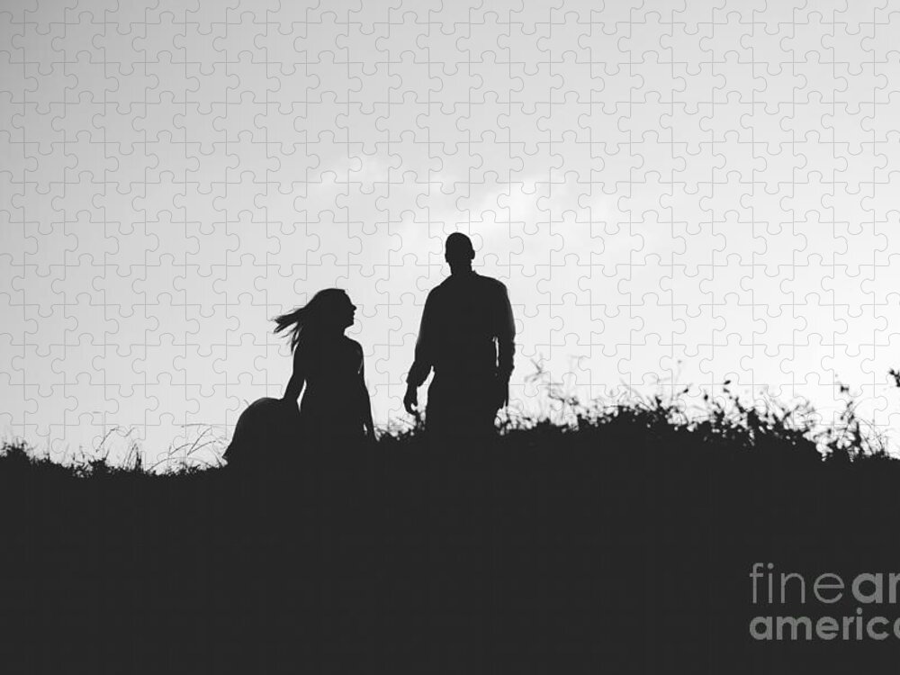 Abstract Jigsaw Puzzle featuring the photograph Silhouette of couple in love with wedding couple on top of a hil by Joaquin Corbalan