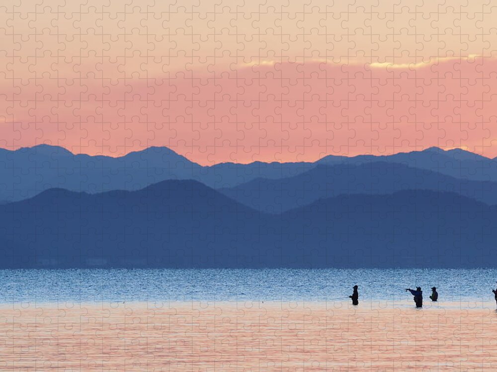 Scenics Jigsaw Puzzle featuring the photograph Silhouette Of Fisherman by Knulp