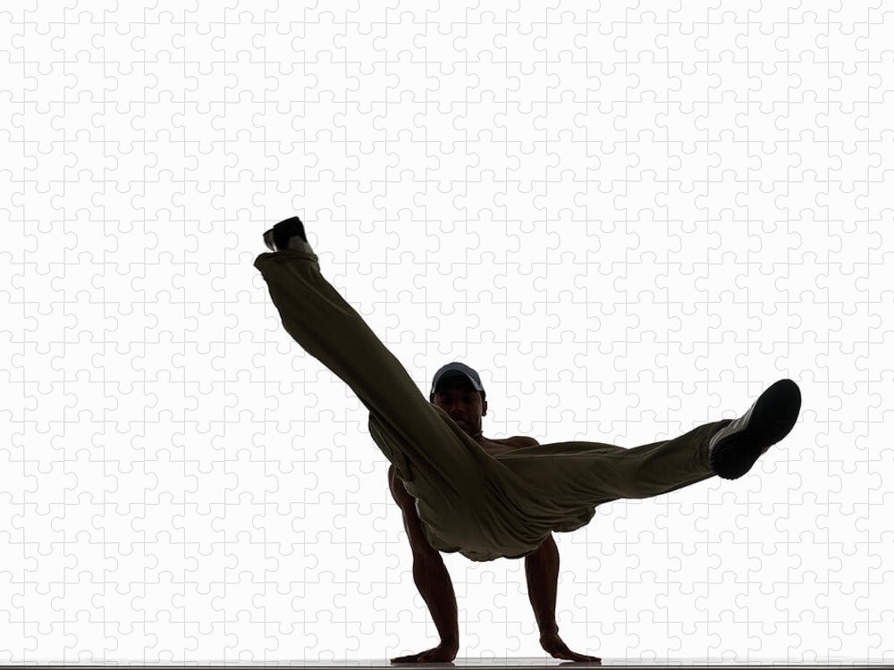 White Background Jigsaw Puzzle featuring the photograph Silhouette Of Male Breakdancer by John Lamb