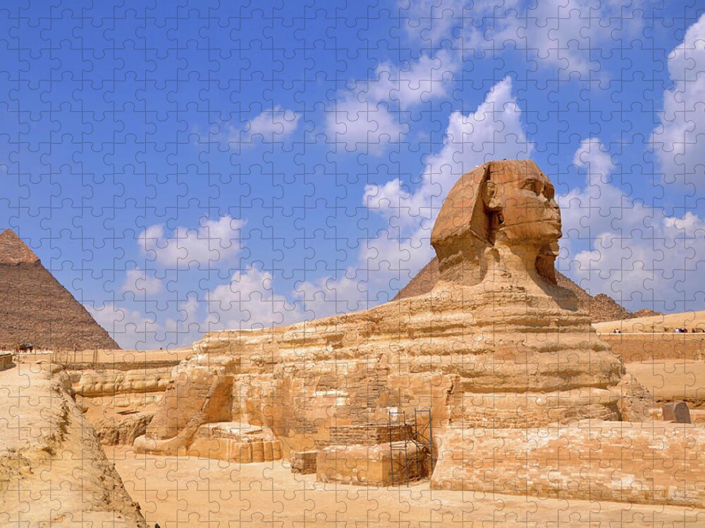 Statue Jigsaw Puzzle featuring the photograph Sphinx And The Pyramids Of Giza by Hhakim