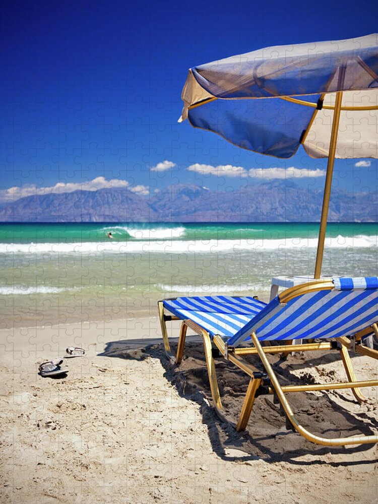Water's Edge Jigsaw Puzzle featuring the photograph Sun Chairs And Umbrella On Beach by Mbbirdy