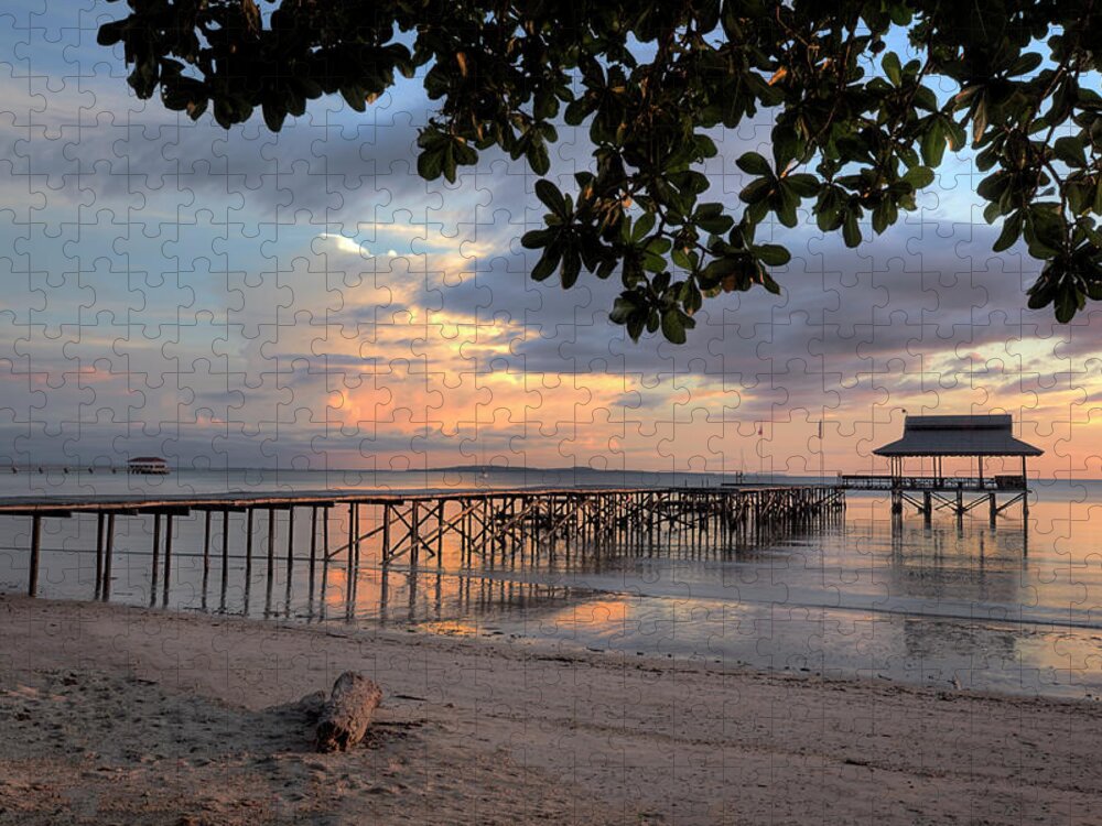 Tropical Tree Jigsaw Puzzle featuring the photograph Sunset At Pier In Borneo, Malaysia by Robas