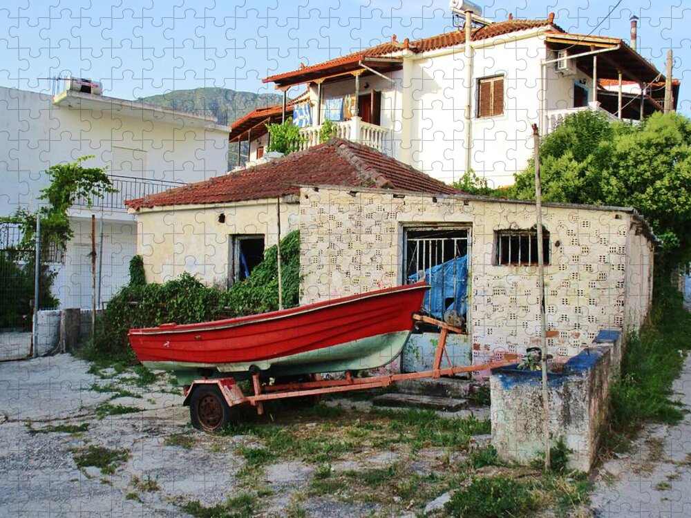 Row Boat Jigsaw Puzzle featuring the photograph The Red Row boat by Rosita Larsson
