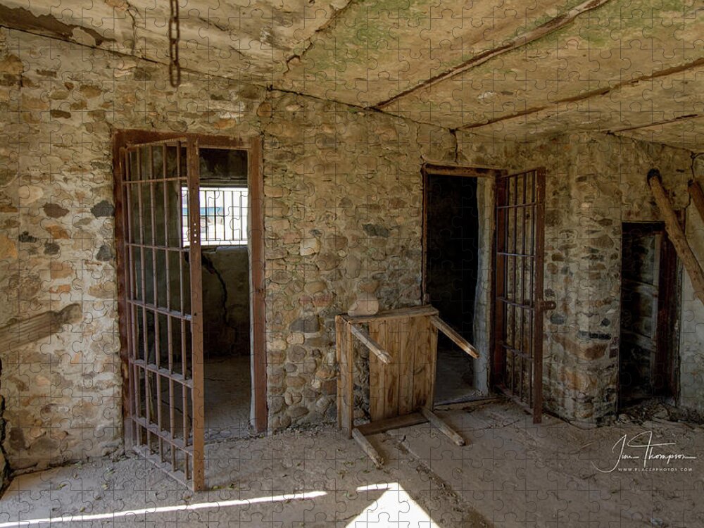 Abandoned Building Jigsaw Puzzle featuring the photograph The Stone Jailhouse Interior by Jim Thompson