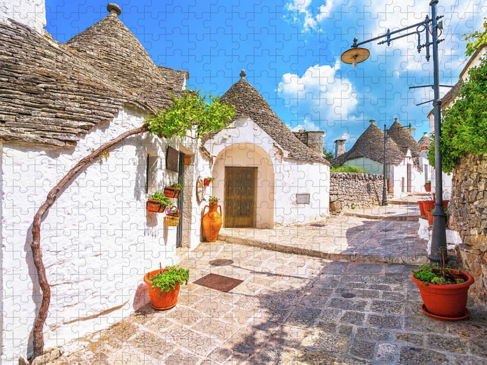 Trulli Jigsaw Puzzle featuring the photograph Alberobello Street, Trulli and Grapevine by Stefano Orazzini