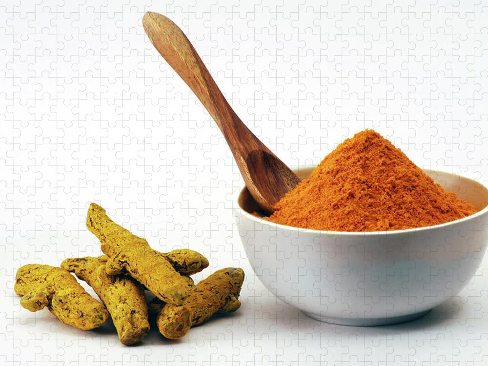 White Background Jigsaw Puzzle featuring the photograph Turmeric Powder In Bowl And Raw Turmeric by Subir Basak