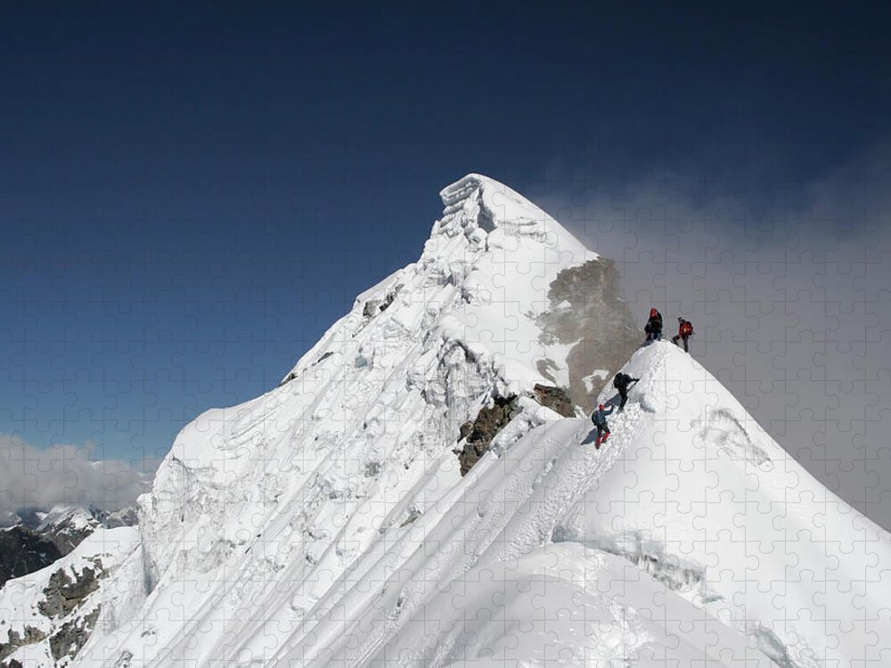 Himalayas Jigsaw Puzzle featuring the photograph Two Climbers Almost At The Top Of A by Dchadwick