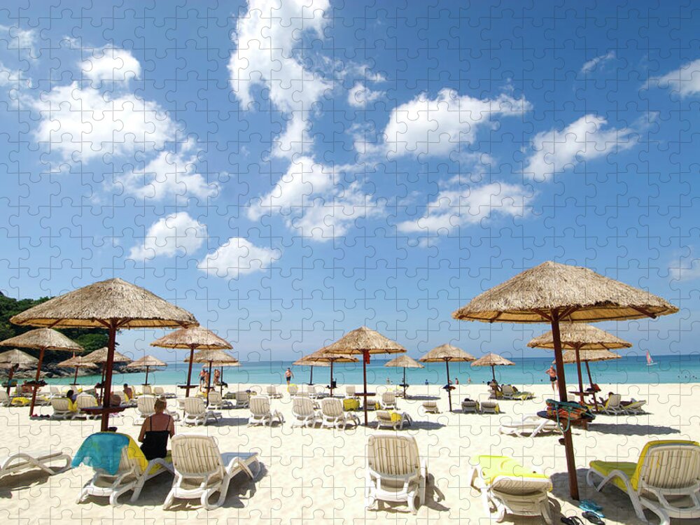 Water's Edge Jigsaw Puzzle featuring the photograph Umbrellas On Beach by Lonely Planet