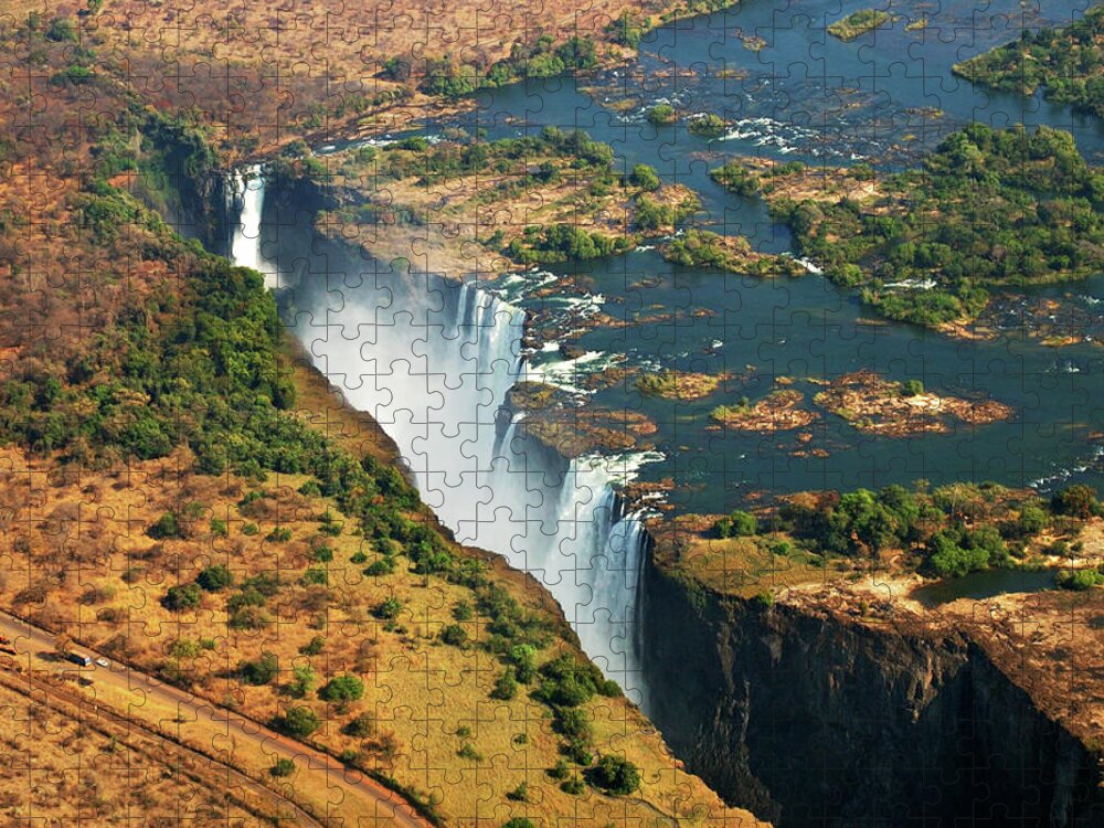 Scenics Jigsaw Puzzle featuring the photograph Victoria Falls, Zambia by © Pascal Boegli