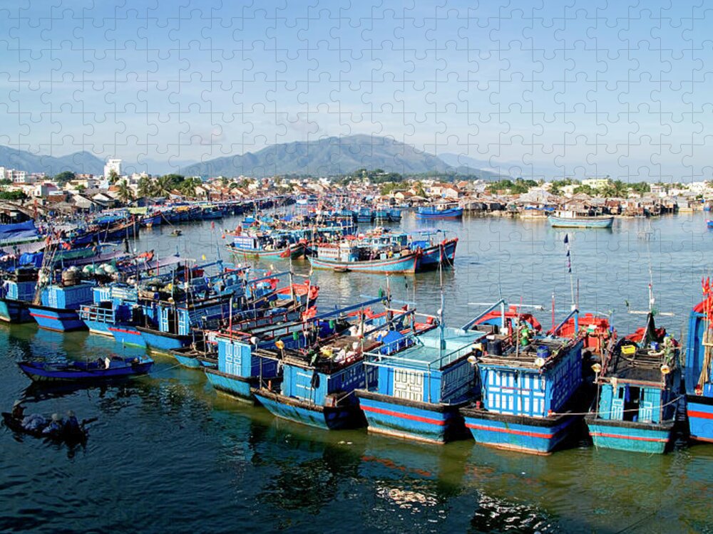 In A Row Jigsaw Puzzle featuring the photograph Vietnam, Nha Trang, Fishing Boats In by David Buffington