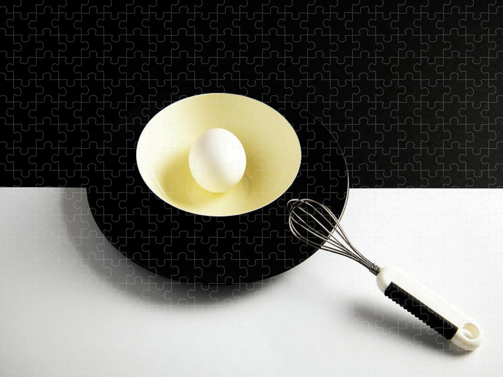 Egg Jigsaw Puzzle featuring the photograph White egg on a yellow bowl. by Michalakis Ppalis