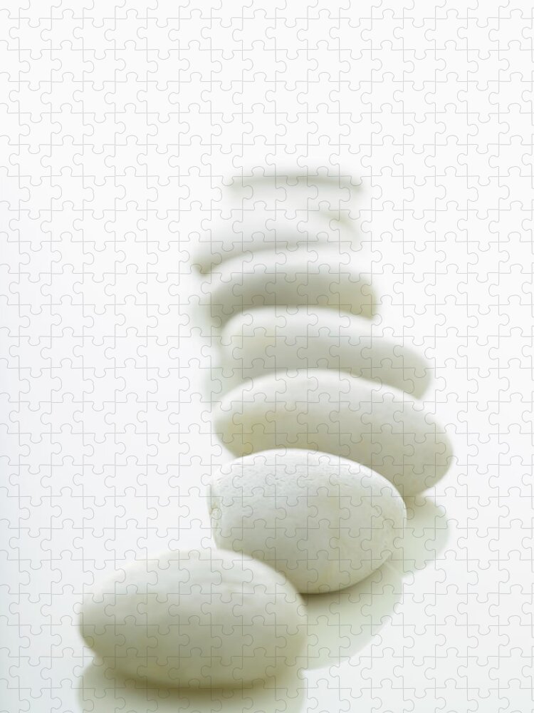 White Background Jigsaw Puzzle featuring the photograph White Stones Lined Up On A White by Rick Lew