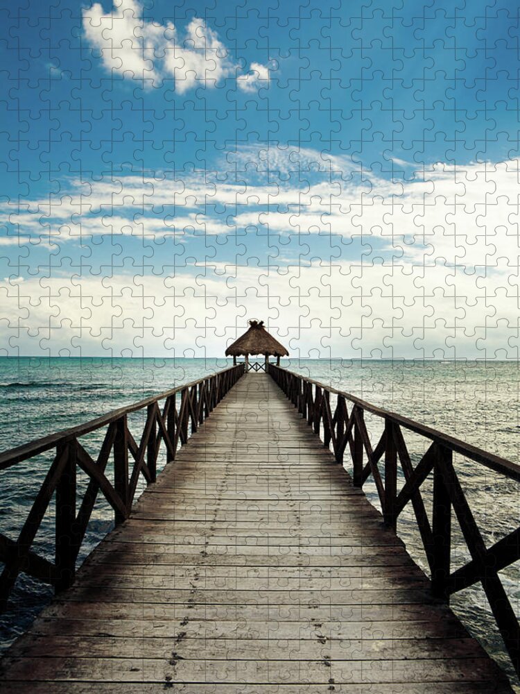 Water's Edge Jigsaw Puzzle featuring the photograph Wooden Jetty by Mmeemil