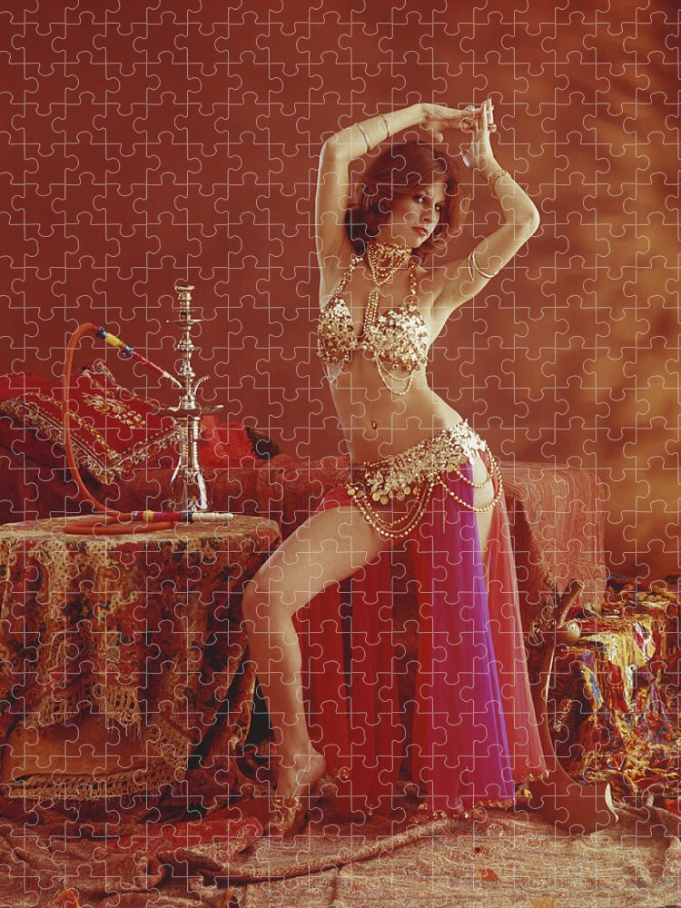 Human Arm Jigsaw Puzzle featuring the photograph Young Belly Dancer Dancing Beside by Tom Kelley Archive