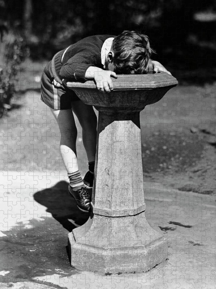Child Jigsaw Puzzle featuring the photograph Young Boy Drinking From Water Fountain by George Marks