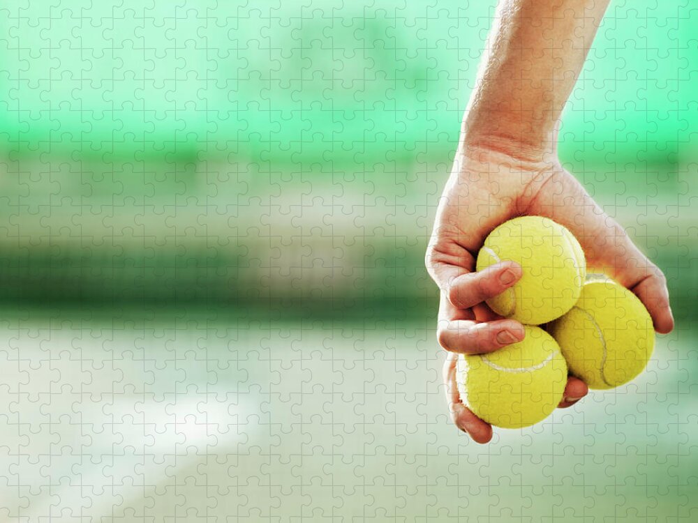 Young Men Jigsaw Puzzle featuring the photograph Young Man Holding Three Tennis Balls In by Henrik Sorensen