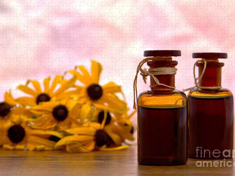 Amber Jigsaw Puzzle featuring the photograph Amber Aromatherapy Bottle with Flower Background by Olivier Le Queinec