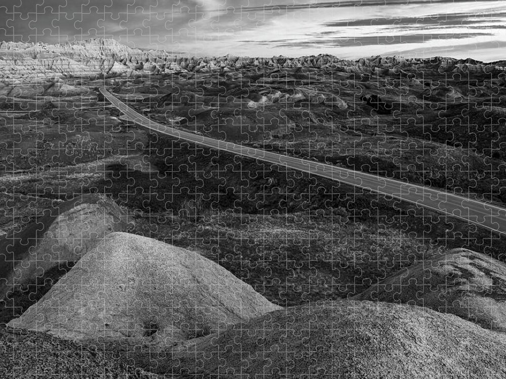 Badlands Road Black And White Jigsaw Puzzle featuring the photograph Badlands Road Black And White #1 by Dan Sproul
