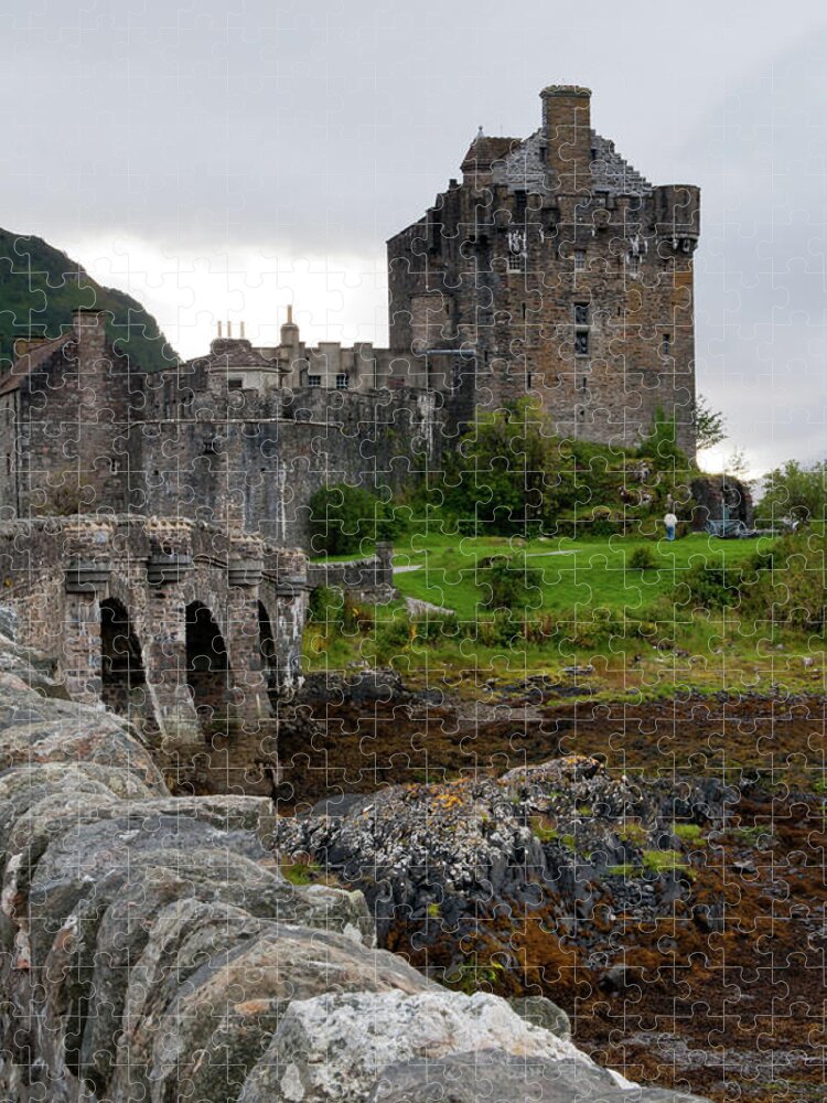 Scotland Jigsaw Puzzle featuring the photograph Eilean Donan Castle in the loch Alsh at the highlands of Scotlan by Michalakis Ppalis