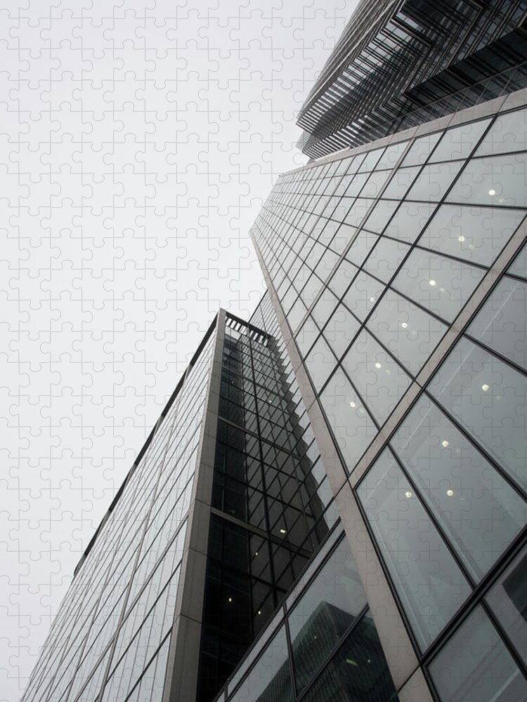Architecture Jigsaw Puzzle featuring the photograph Modern glass skyscraper office building #1 by Michalakis Ppalis