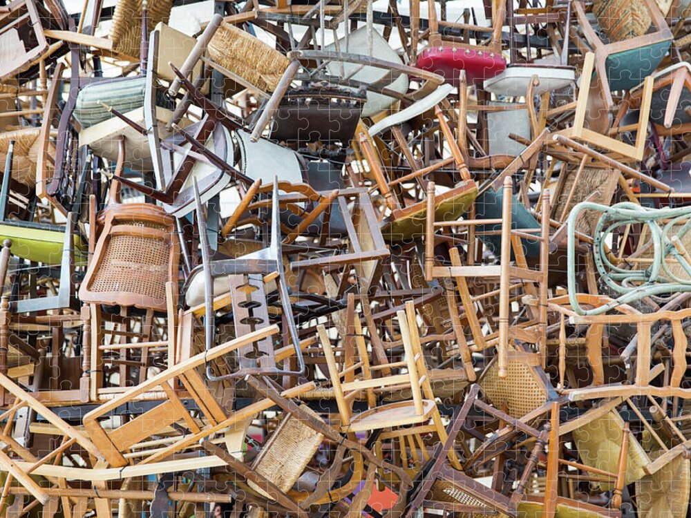 Abandoned Jigsaw Puzzle featuring the photograph Stack Of Chairs by Maria Kray