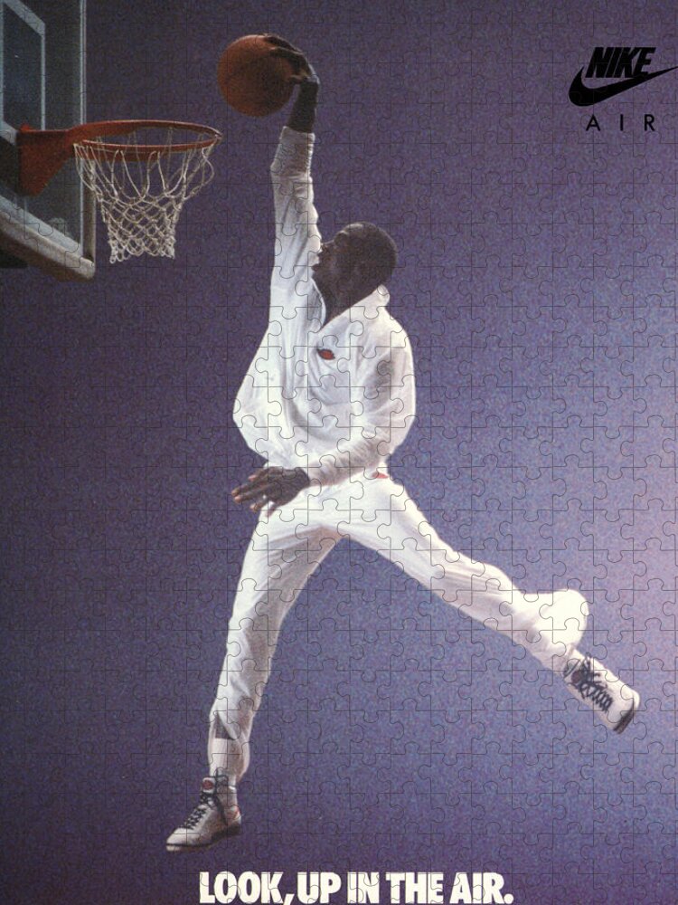 Ad Jigsaw Puzzle featuring the mixed media 1987 Nike Jordan Up In The Air Ad by Row One Brand