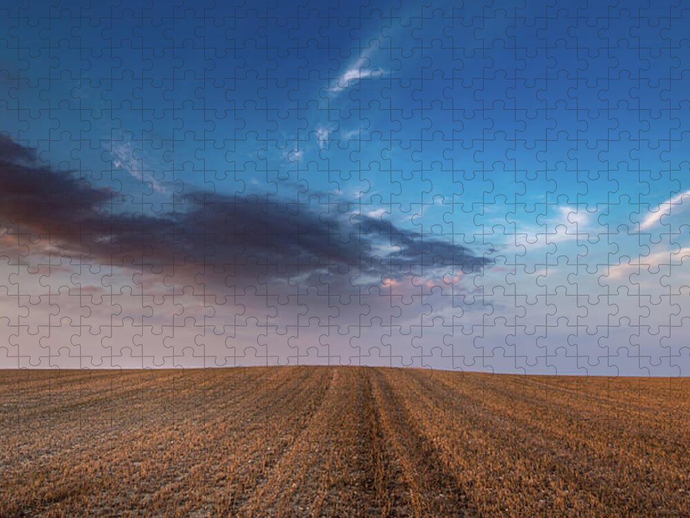 Nightfall Jigsaw Puzzle featuring the photograph Agricultural meadow field and cloudy sky during sunset. by Michalakis Ppalis