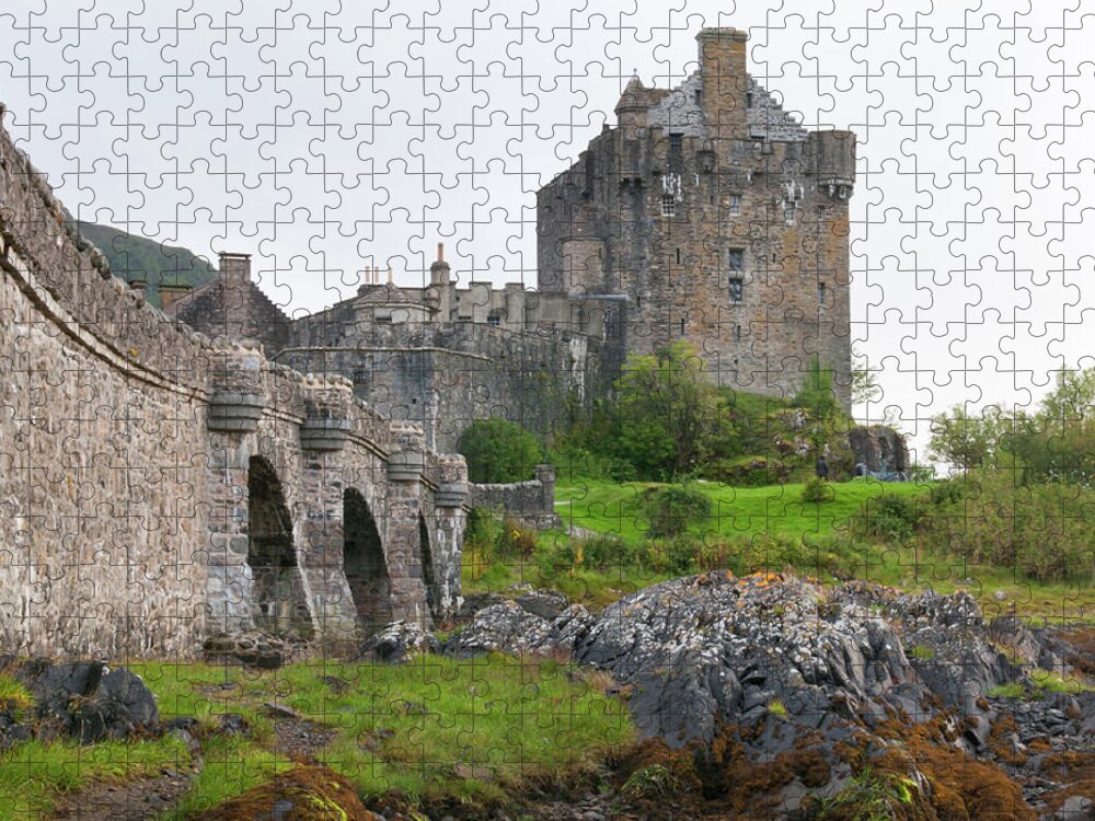 Scotland Jigsaw Puzzle featuring the photograph Eilean Donan Castle in the loch Alsh at the highlands of Scotlan by Michalakis Ppalis