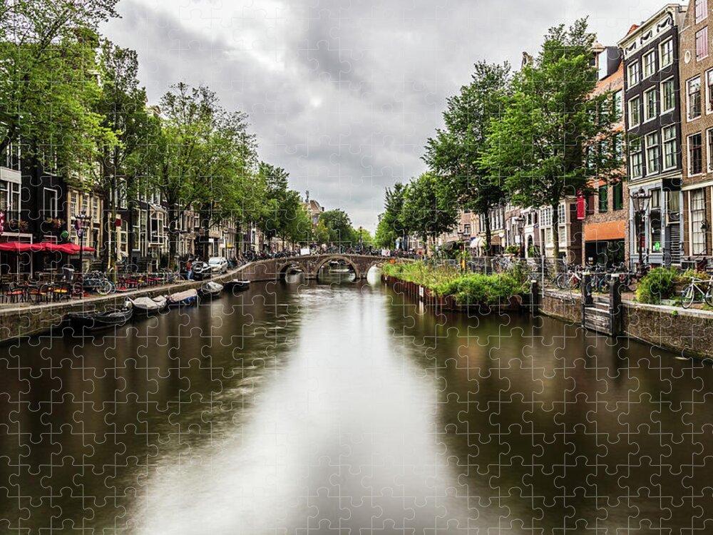 Canal Jigsaw Puzzle featuring the photograph Water canal in Amsterdam #3 by Fabiano Di Paolo