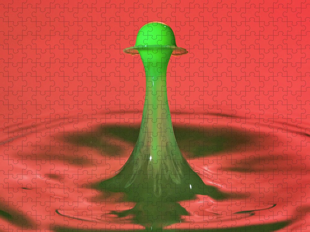 Waterdrop Jigsaw Puzzle featuring the photograph Water drop falling onto column of water by Steven Heap