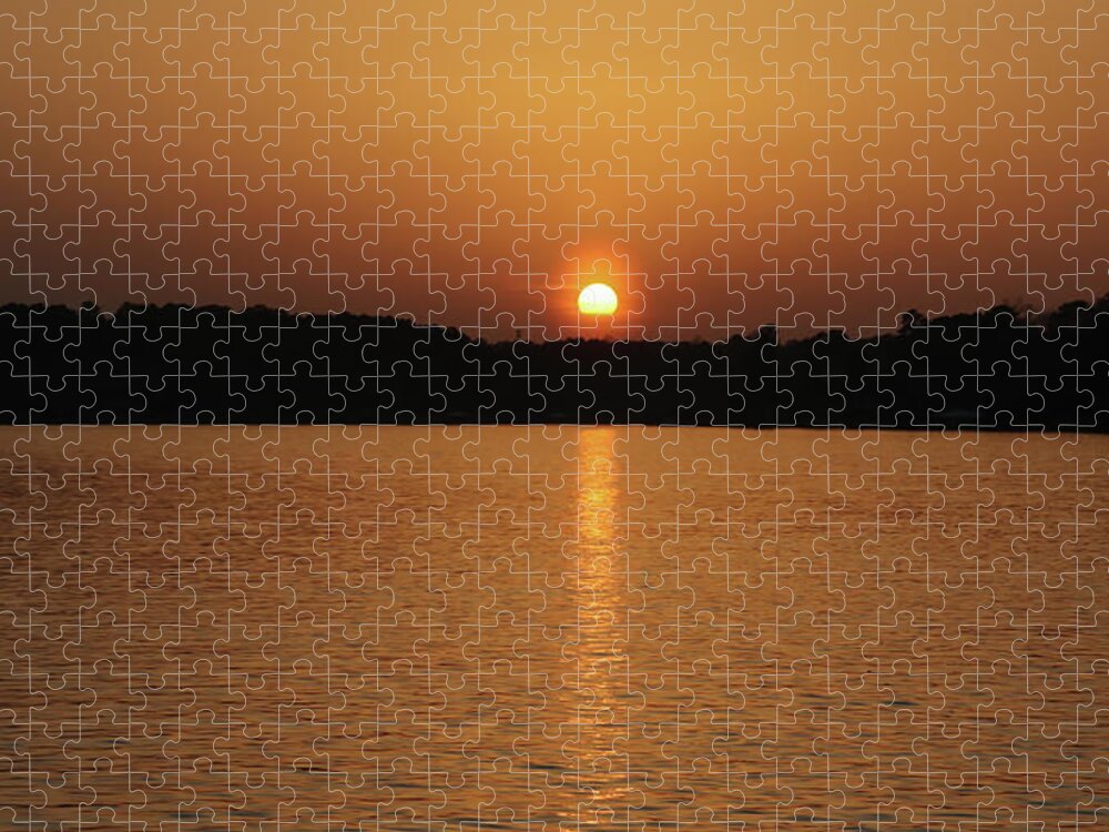 Lake Jigsaw Puzzle featuring the photograph A Veiled Sun Sunset by Ed Williams