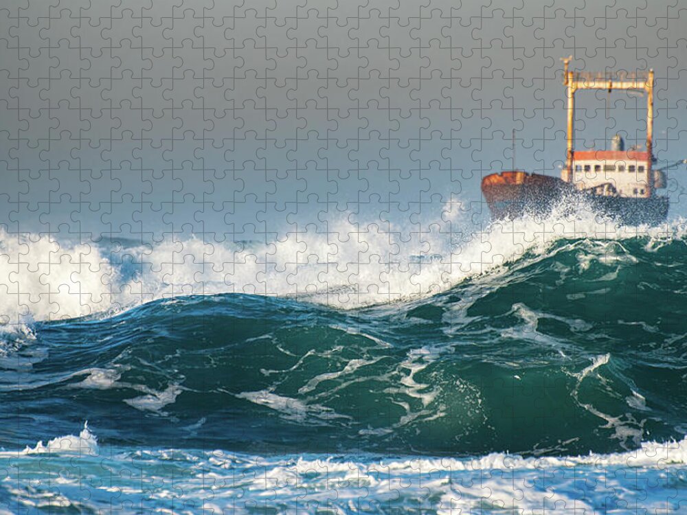 Shipwreck Jigsaw Puzzle featuring the photograph Abandoned ship in the stormy ocean by Michalakis Ppalis