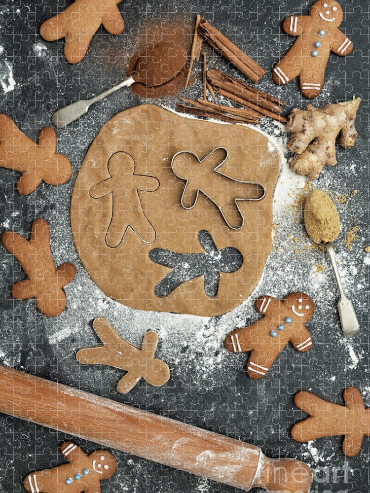 Gingerbread Men Jigsaw Puzzle featuring the photograph Baking Gingerbread Men Biscuits by Tim Gainey
