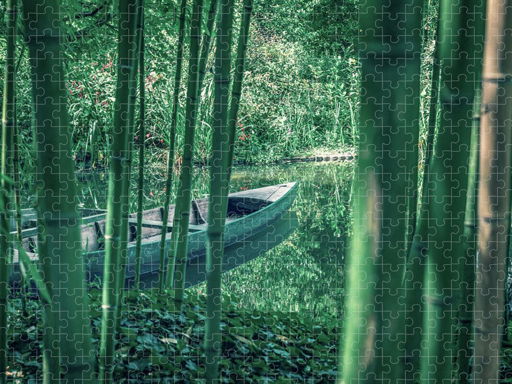 Environmental Conservation Jigsaw Puzzle featuring the photograph Bamboo forest and Rowboat on a small pond by Benoit Bruchez